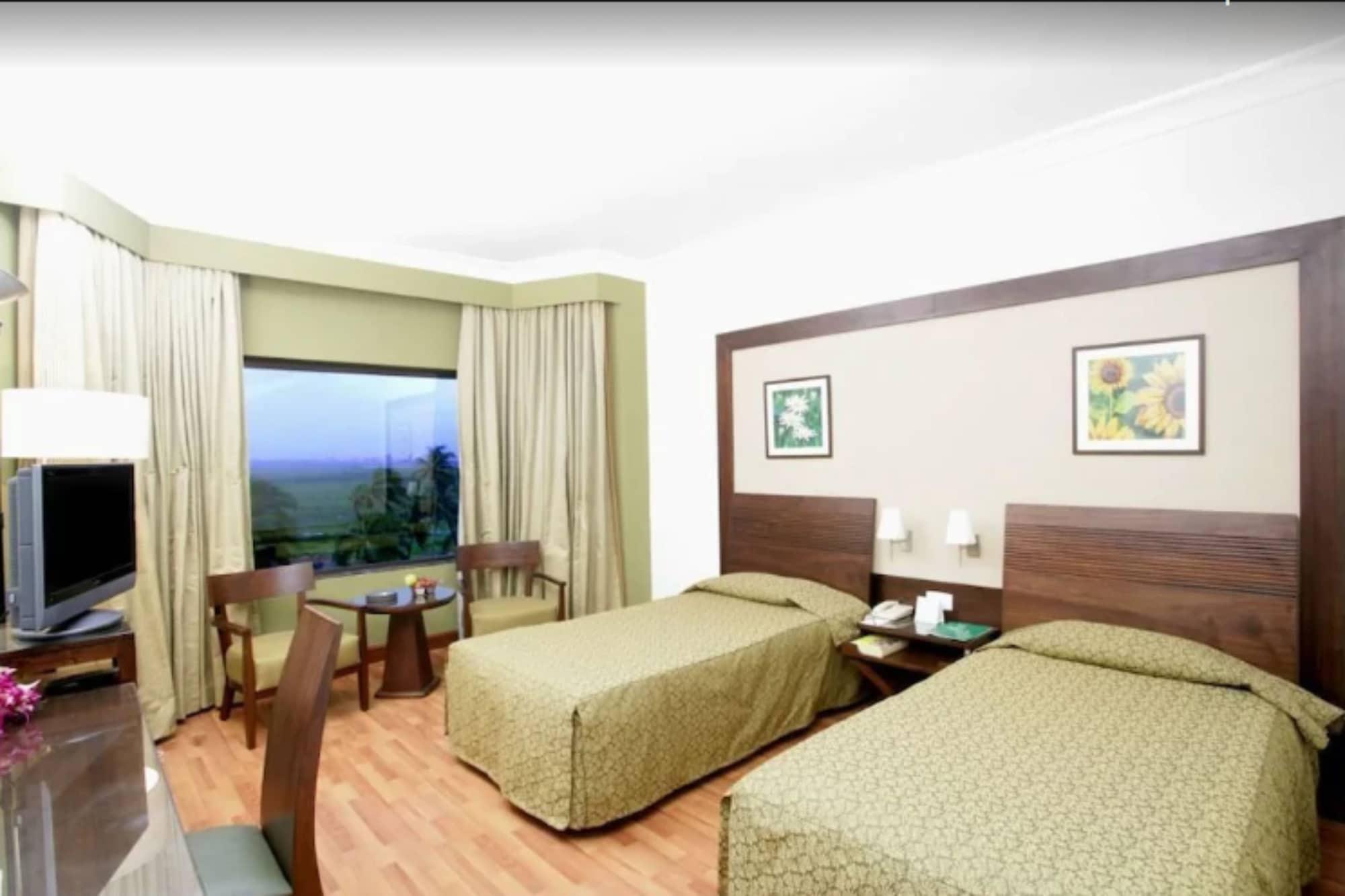 The Retreat Hotel & Convention Centre Mumbai Rum bild